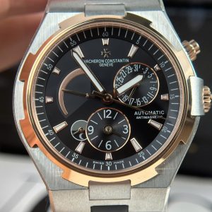 Đồng Hồ Vacheron Constantin Rep 11 Overseas Dual Time 47450 Demi Vàng Hồng Xưởng 9F 42mm (2)